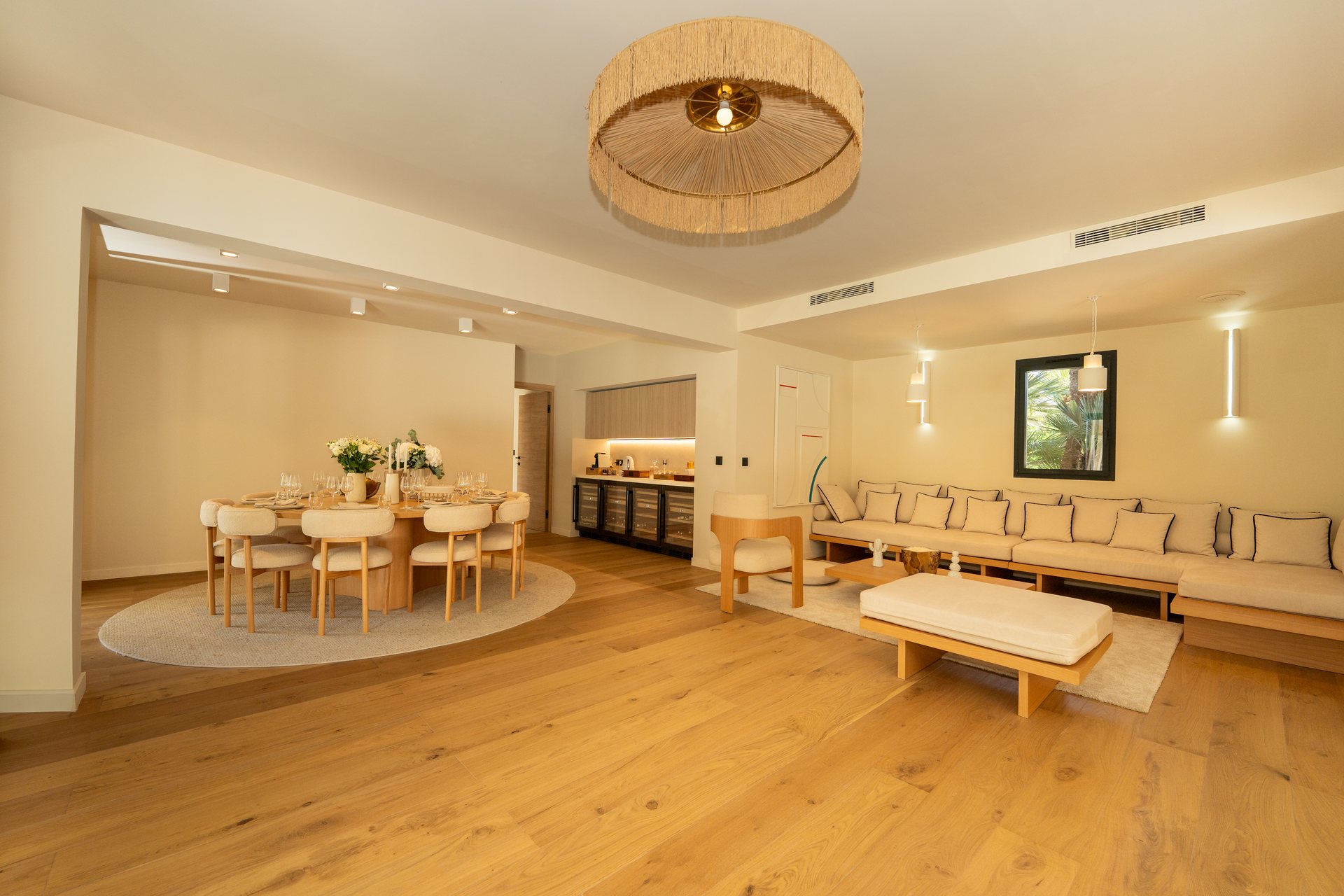 Villa Carpe Diem Grand Salon — Vertigo chandelier, natural oak floors, retractable glass wall